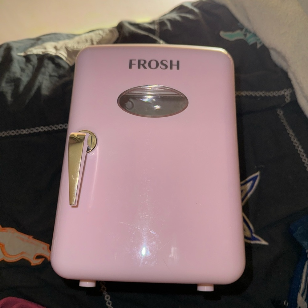Pink mini fridge